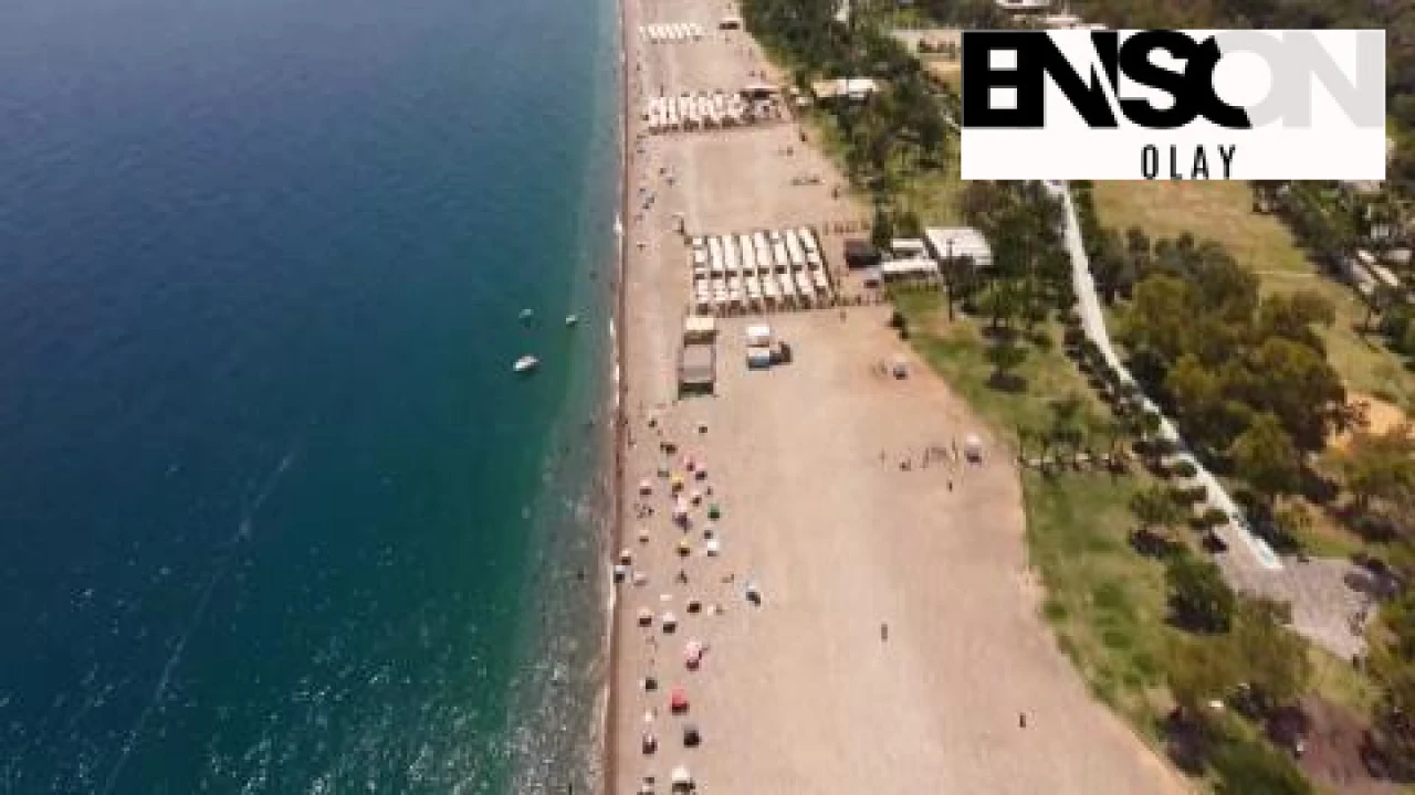Antalya'da Sıcak Hava Dalgası: Konyaaltı Sahili Bunalıyor!
