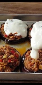 Yeni bir tat keşfi: Beşamel Soslu Kıymalı Patlıcan Oturtma tarifiyle mutfağınıza lezzetli bir dokunuş yapın!