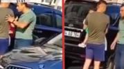 Trafikteki canavar kucağında çocuğu olan babaya saldırdı