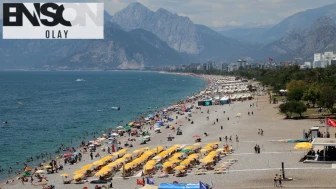 Sıcaklık 30 derecenin üzerine çıktı; vatandaşlar sahile akın etti
