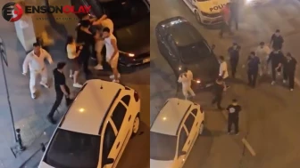 Sokak ortasında meydan savaşı: Otomobilin üstüne yatırıp acımasızca dövdüler