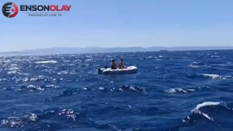 Ayvalık açıklarında sürülen bot fırtınaya yakalandı : 2 kişi kurtarıldı