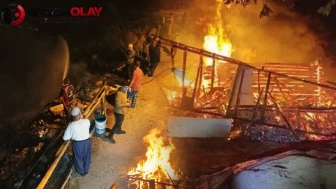 Hızla evi saran alevlerden pencereden atlayarak kurtuldular!