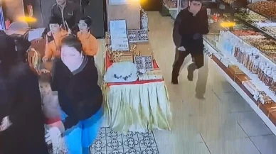 Depremde korkudan bayılan kadın müşteriyi böyle kurtardı