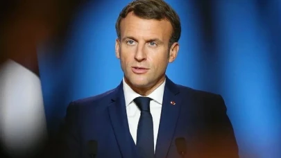Macron'u üzecek gelişme! Müze çalışanı gibi davranıp örtüye sardılar