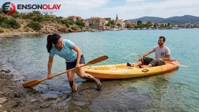 Cunda Adası'nda suya giren kadın çamura saplandı ! Kanodan destek alarak kurtuldu