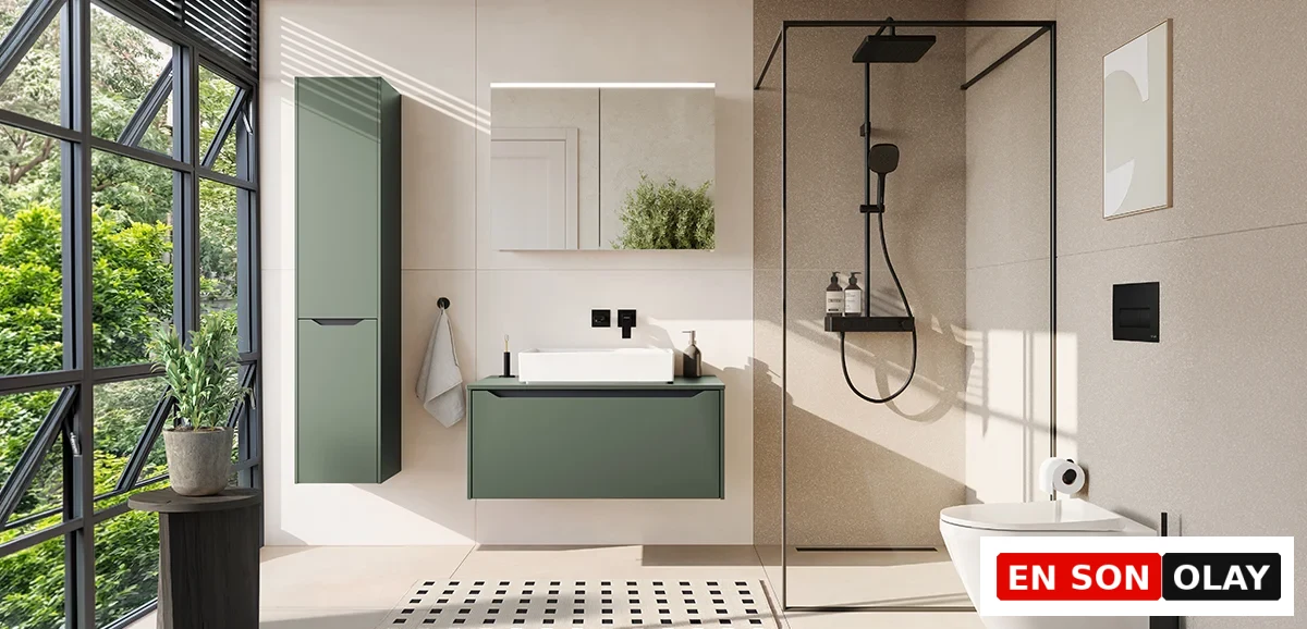 Modern bir banyoda, açık renkli çift lavabo tezgahı, antrasit dokulu duvar ve siyah armatürlerin ahşap bir tabure ile dengelendiği, kişisel ve bütünlüklü bir banyo tasarımında Mix & Match yaklaşımıyla sağlanan renk uyumunu gösteren şık bir görünüm.