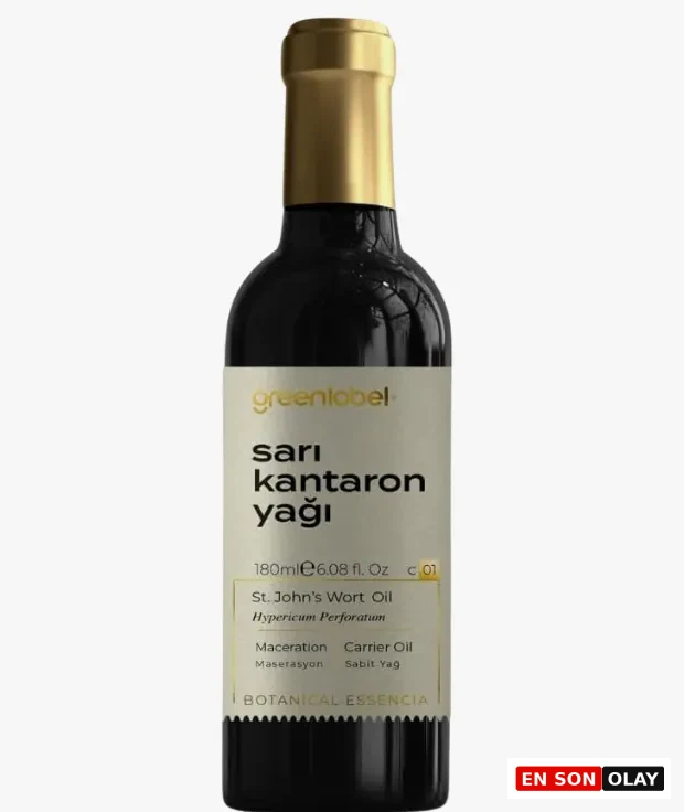Koyu renk cam şişe, altın rengi kapağı ve bej etiketiyle, güneş sonrası cilt bariyeri güçlendirme ve doğal onarım mekanizmalarını destekleyen 180 ml Greenlabel Sarı Kantaron Yağı ürününü vurgulamaktadır.