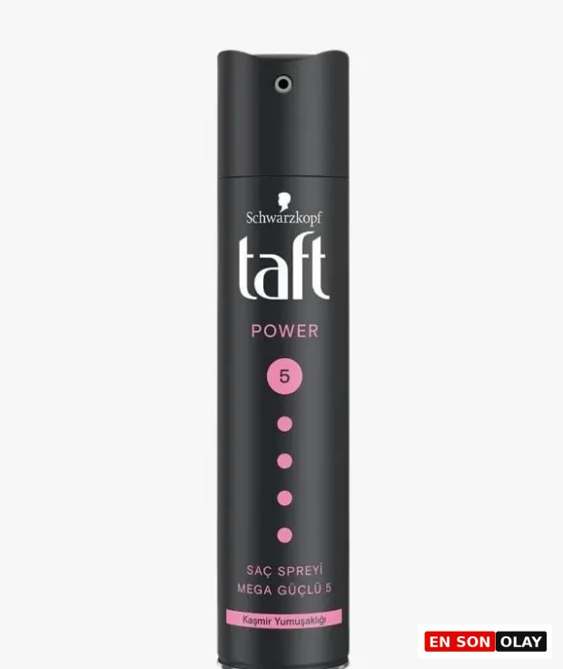 Düz beyaz bir arka plan üzerinde dikey duran, Schwarzkopf markasının taft POWER serisine ait, üzerinde pembe daire içinde 5 rakamı ve beş pembe nokta ile SAC SPREYİ MEGA GÜÇLÜ 5 Kaşmir Yumuşaklığı yazan siyah renkli bir sabitleme spreyi kutusu.