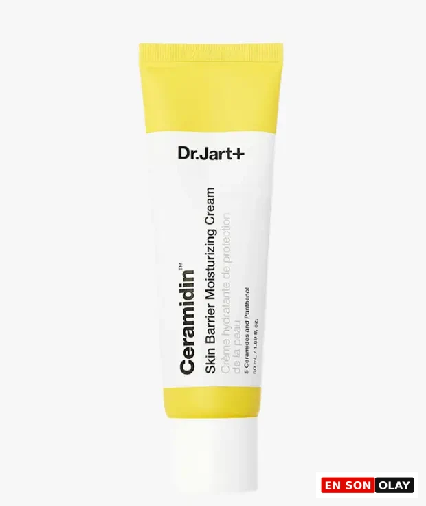 Marka Adı: Dr.Jart+
Ürün Adı: Dr.Jart+ Ceramidin Cilt Bariyeri Nemlendirici Krem
Ürün Cinsiyeti: Unisex
Ürün Tipi: Nemlendirici Krem
Ürün Sezonsallığı: Dört Mevsim
Ürün Çeşidi: Cilt Bariyeri Destekleyici Nemlendirici
Ürün Özellikleri: Bu Dr.Jart+ Ceramidin Cilt Bariyeri Nemlendirici Krem, cildin doğal bariyerini güçlendirmek ve derinlemesine nemlendirmek üzere özel olarak formüle edilmiştir. İçeriğinde 5 farklı seramid ve panthenol barındırarak cildin nem bariyerini destekler, nem kaybını önlemeye yardımcı olur ve cildi çevresel faktörlere karşı daha dirençli hale getirir. 50 ml'lik pratik tüp ambalajı ile kolayca uygulanabilir ve cilde pürüzsüz, rahat bir his bırakır. Hafif yapılı dokusu sayesinde ciltte ağırlık yapmaz ve hızlıca emilir.
Öne Çıkan Detaylar:
- Cilt bariyerini güçlendirmeye yardımcı olan 5 Seramid ve Panthenol içerir.
- Cilde yoğun nem desteği sağlar ve nem kaybını en aza indirmeyi hedefler.
- 50 ml'lik boyutuyla günlük kullanıma ve taşımaya uygundur.
Kimler Kullanıyor?: Cilt bariyerini güçlendirmek, kuruluk ve hassasiyet problemlerini gidermek isteyen herkes için idealdir. Çevresel etkenlere karşı cildini koruma altına almak, nem dengesini sağlamak ve daha sağlıklı bir cilt görünümüne kavuşmak isteyenler, bu seramid ve panthenol zengini formülü günlük rutinlerine dahil edebilirler. Tüm cilt tiplerinin kullanımına uygun olup, özellikle nem kaybı yaşayan ve bariyer desteğine ihtiyaç duyan ciltler için önerilir.