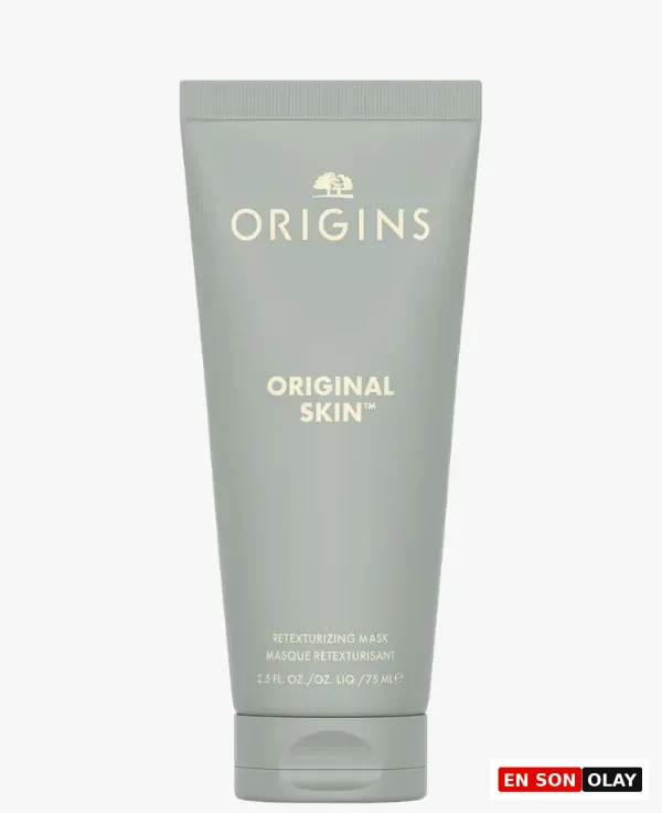Origins markasının, üzerinde altın rengi ağaç logosu ve ORIGINAL SKIN yazısı bulunan, cilt dokusunu düzenlemeye yönelik RETEXTURIZING MASK ürünü olan 75 ml'lik açık adaçayı yeşili tonlarında bir tüp, beyaz zeminde dikey konumda gösteriliyor.