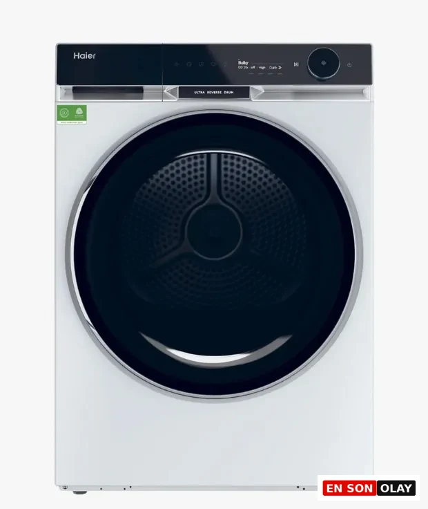 Beyaz renkli Haier marka önden yüklemeli çamaşır kurutma makinesi; geniş koyu cam kapak, dijital ekranlı kontrol paneli ve modern minimalist tasarım.