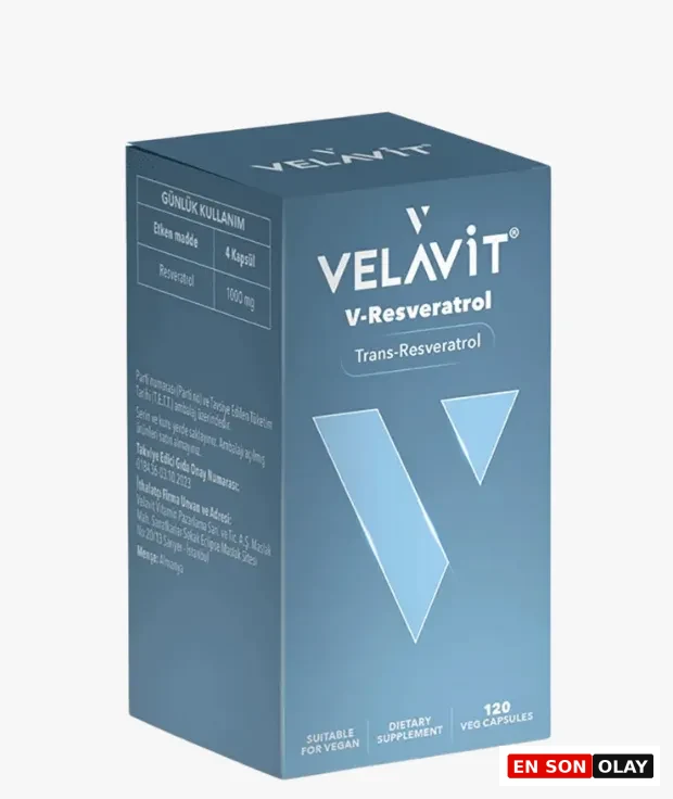 Mavi renkli Velavit V-Resveratrol takviyesi kutusu, üzerinde belirgin bir şekilde Trans-Resveratrol ifadesi ve 120 vegan kapsül içerdiği bilgisiyle, günlük 1000 mg resveratrol dozu sunarak uzun yaşam (longevity) ve hücresel gençleşme arayışındaki bireyler için tasarlanmış bir ürünü görselleştiriyor.