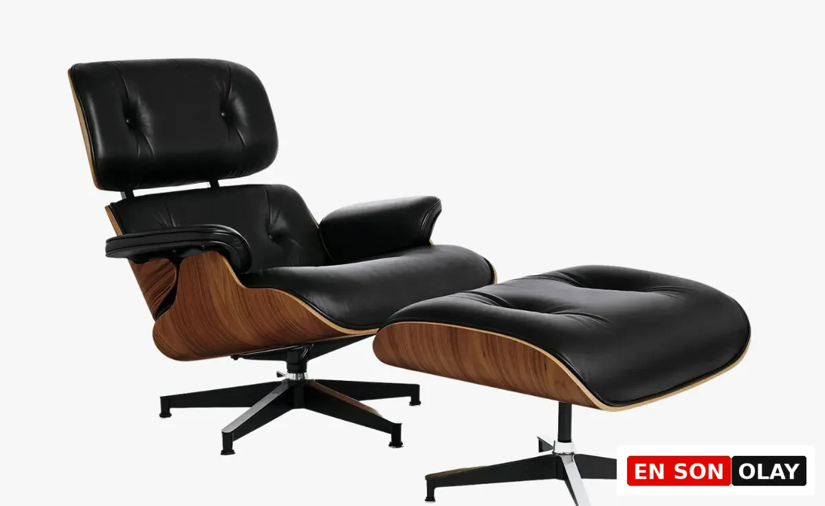 Modern ve zamansız bir klasiği temsil eden Eames tekli koltuk ve ona eşlik eden pufu, koyu renk deri döşemesi ve belirgin kavisli ahşap iskeletiyle sofistike iç mekanlara eşsiz bir rahatlık ve zarafet katmaktadır.